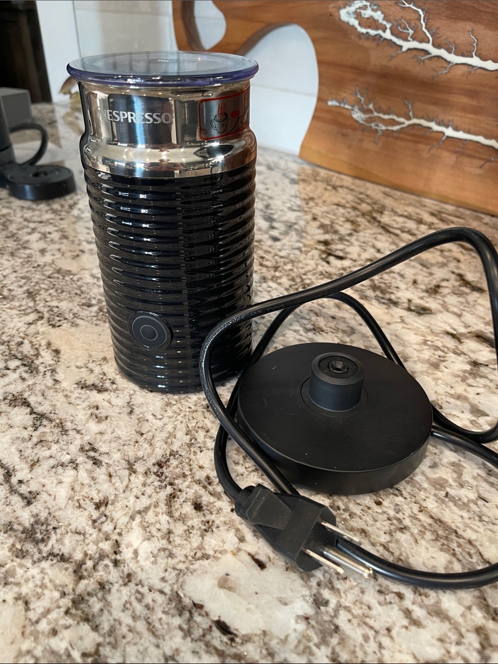 Nespresso milk frother with base
